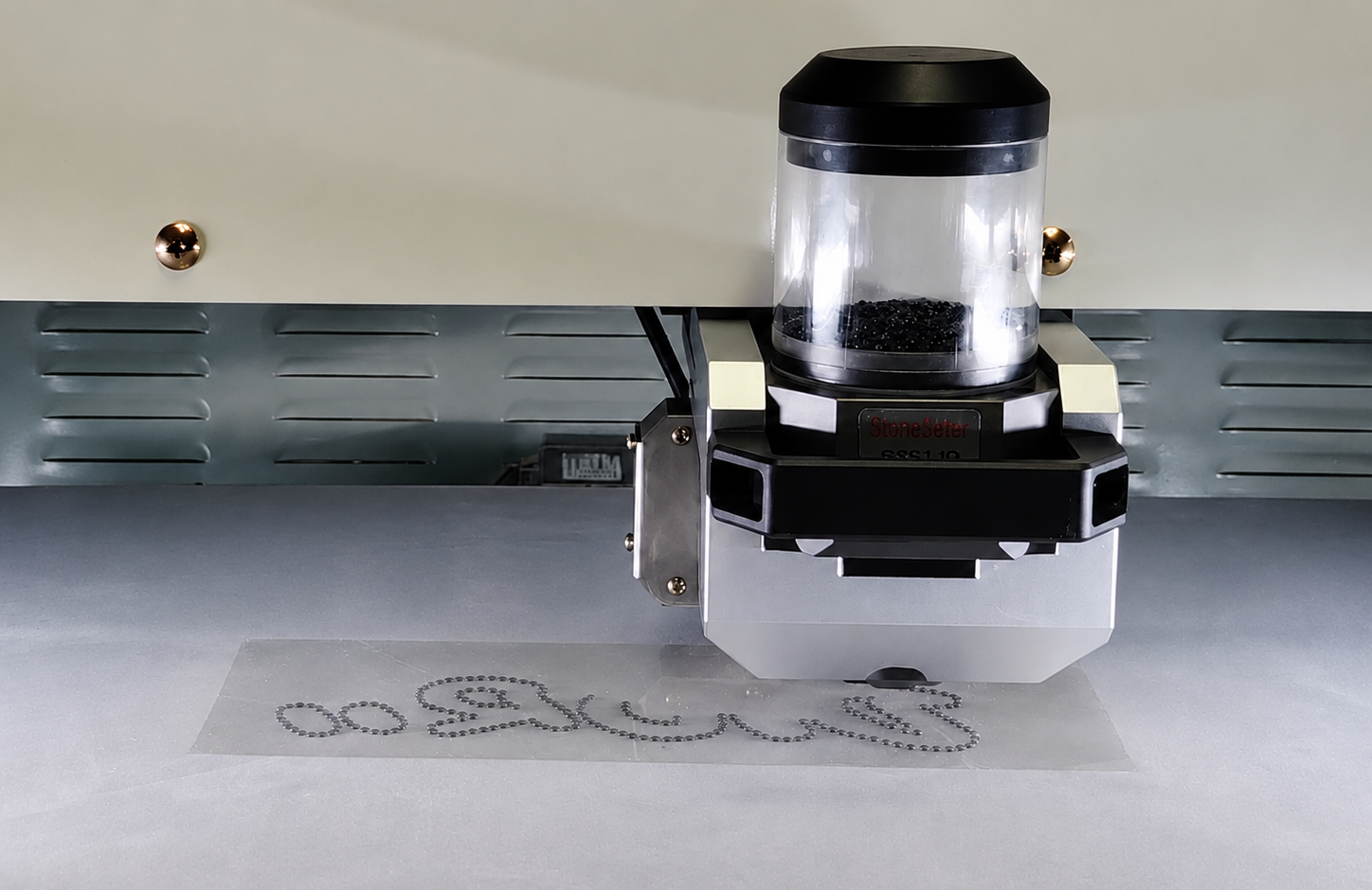 VT-600HMc placing rhinestones onto transfer paper